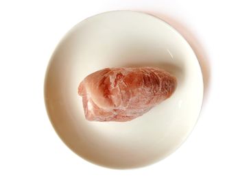 Directly above shot of cake on white background