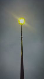 Low angle view of illuminated street light