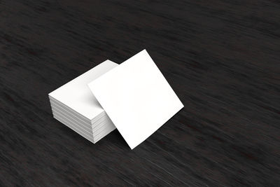 High angle view of white paper on table