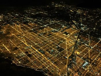 Illuminated cityscape at night