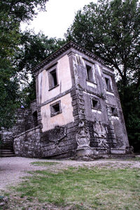 Low angle view of old building against sky