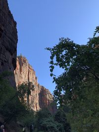 Low angle view of rock formation against sky