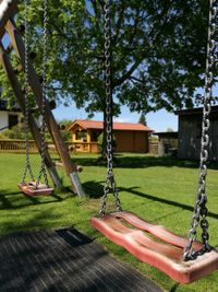 Close-up of swing in park