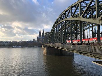 Bridge over river against sky