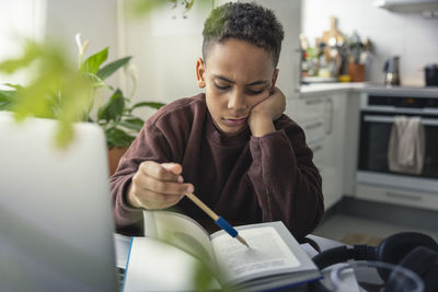 Boy doing homework at home