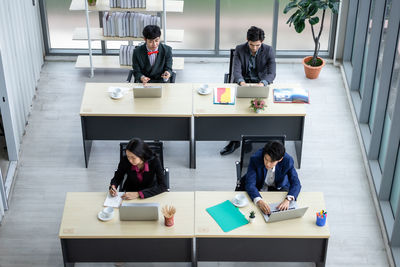 High angle view of business people working at office