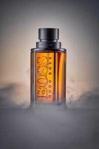Close-up of glass bottle on table