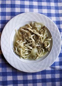 Close-up of noodles in plate on table