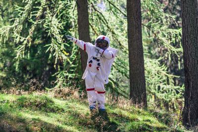 View of man running in forest