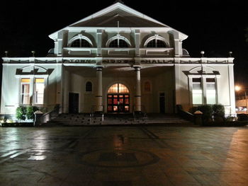 Illuminated building at night