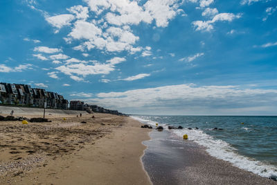 Scenic view of beach against sky