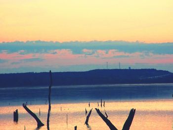 Scenic view of mountains against sky during sunset