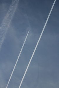 Low angle view of vapor trail in sky