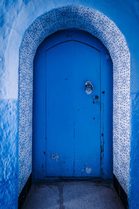 Closed door of abandoned building