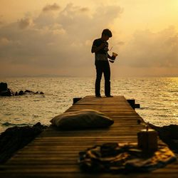 Portrait of man playing in sea