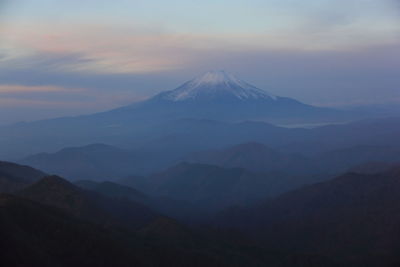 Scenic view of mountains against sky during sunset