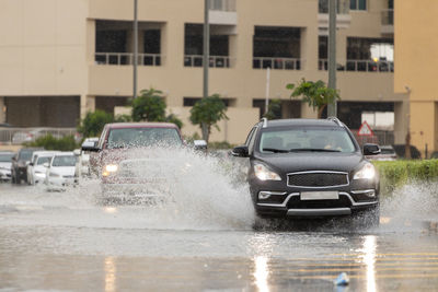 Wet car on road in rain