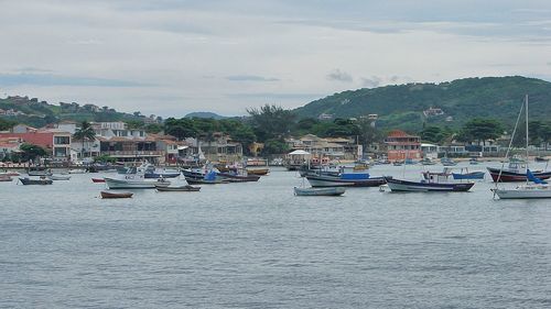 Boats moored at harbor