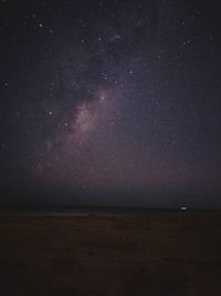 Scenic view of sea against sky at night