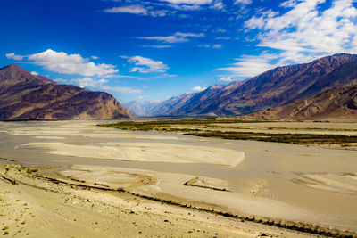 Scenic view of desert against sky