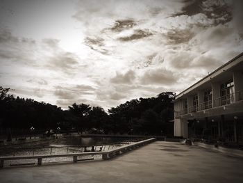 Building against cloudy sky