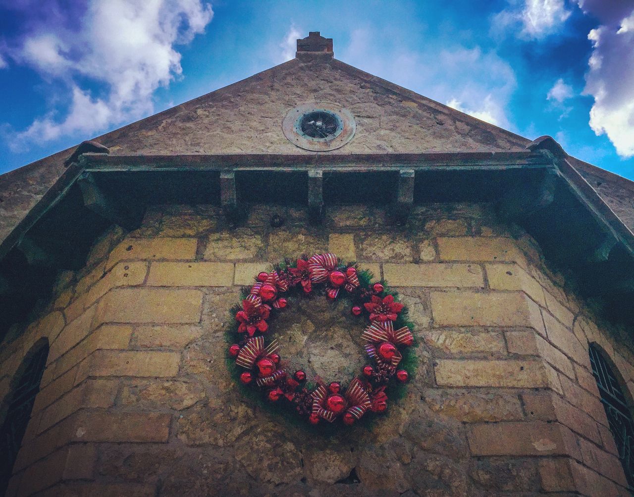 red, building exterior, architecture, built structure, sky, outdoors, low angle view, no people, day, flower, cloud - sky, close-up