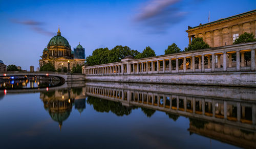 Reflection of building on river