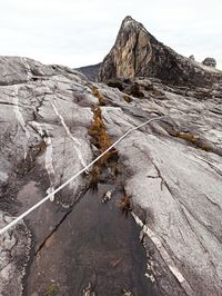 Scenic view of rocky mountain against sky