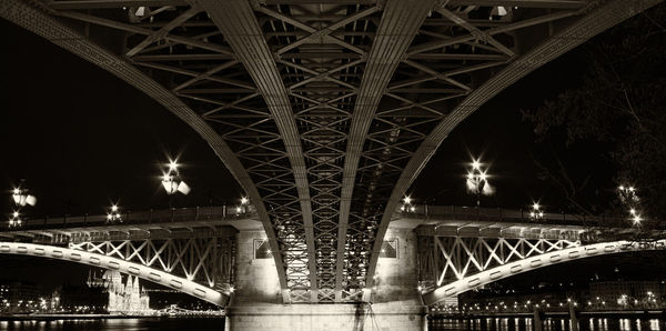 Low angle view of bridge at night