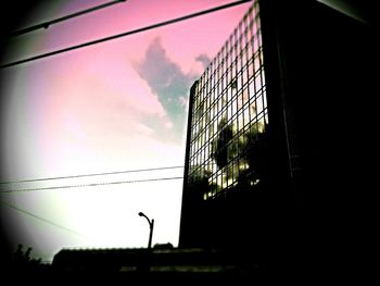 Low angle view of modern building against sky