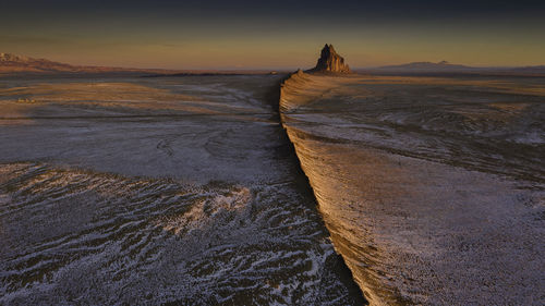 Scenic view of land during sunset