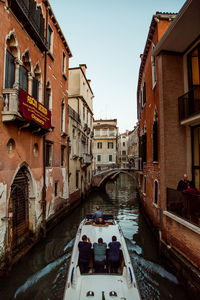 Canal passing through city buildings