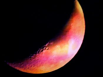 Close-up of moon over black background