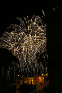 Firework display at night