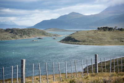 Scenic view of landscape and mountains against sky