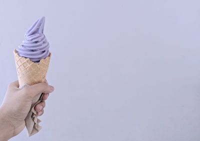 Hand holding ice cream