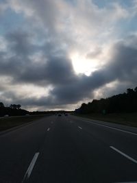 View of road against cloudy sky