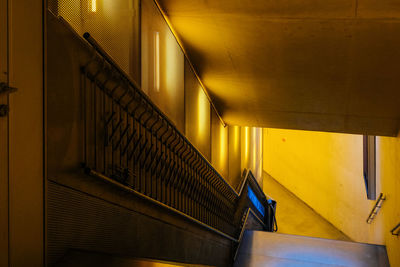 Low angle view of illuminated staircase in building