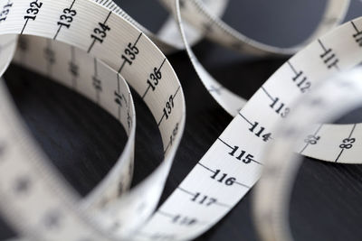 High angle view of measuring tape on table