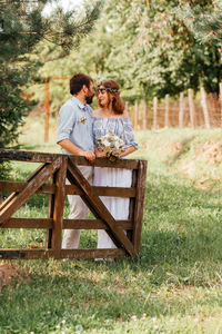 Happy couple kissing in park