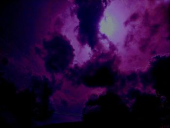 Low angle view of purple sky at night