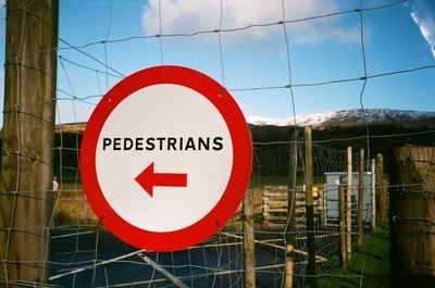 No parking sign against sky