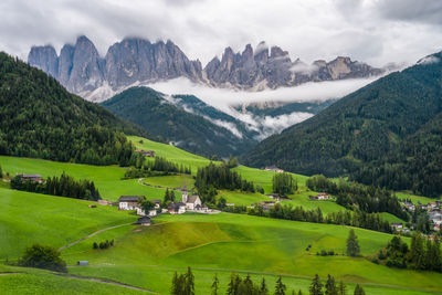 Scenic view of landscape and mountains against sky