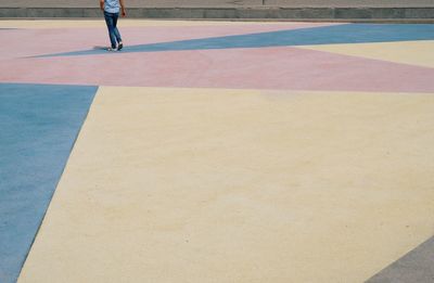 Low section of person with umbrella