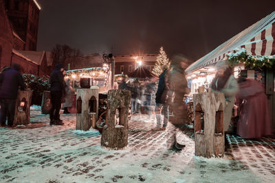 People enjoy christmas market in winter riga in latvia.