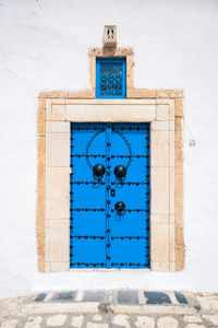 Old, elegant entrance to the house. tunisian doors