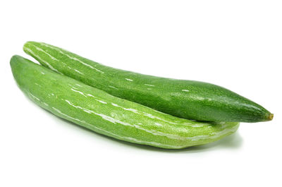 Close-up of green leaf against white background