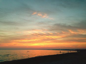 Scenic view of sea at sunset