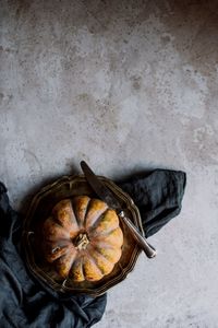 High angle view of pumpkin on table against wall