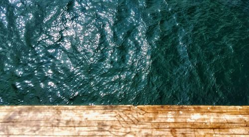 High angle view of swimming pool by sea